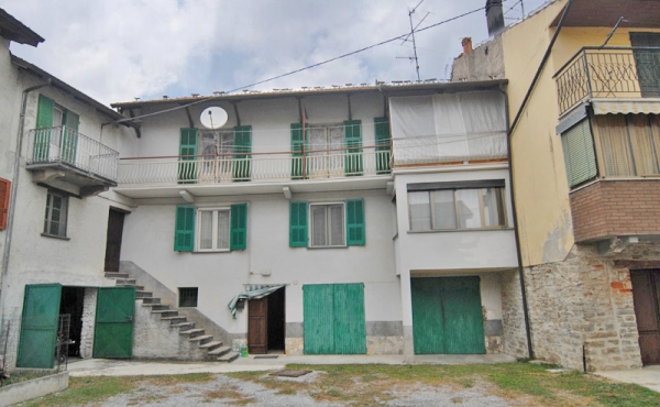 A Row House with Two Apartments in Walking Distance of the Town’s Center 